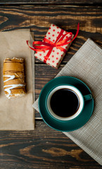 mug of coffee and cake, gift, wooden background