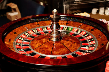 Casino theme. Golden roulette wheel closeup