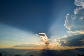 Sunset over clouds from the top