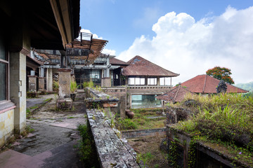 Fototapeta na wymiar Bali, Indonesia - 22 Nov 2018: PI Bedugul Taman Rekreasi Hotel & Resort is an large abandoned structure in Bedugul, today a tourist attraction in Bali, Indonesia.