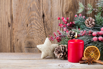 Christmas greeting card. Festive decoration on wooden background. New Year concept. Copy space.  Flat lay. Top view.