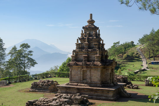 Candi Gedong Songo at sunrise. A 9th-century Buddhist temple complex on a volcano near Semarang, Java, Indonesia.