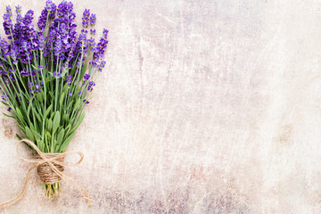 Lavender flowers, bouquet on rustic background, overhead.