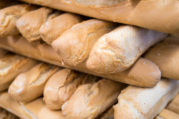 fresh bread on the shelves in bakery, food