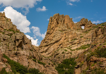 Fototapeta na wymiar Natural Rock Arch in the Rocky Mountains