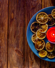 Decoration for the new year of citrus with a candle