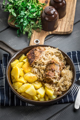 Fried ribs in sauerkraut.