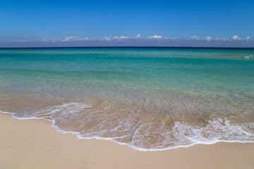 Soft wave on a white sand beach