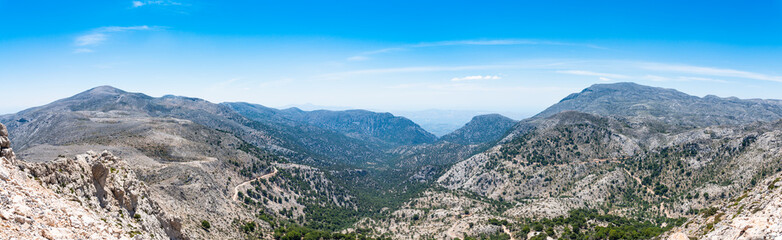 Fototapeta na wymiar Psilorities mountain range panoramic skyline view. Mountaineering adventure trekking paradise, hiking paths, biking trails, challenging peaks at over 2000m altitude. Heraklion, Crete Greece.
