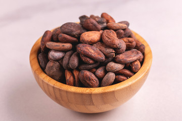 Bowl full of aromatic raw cocoa beans