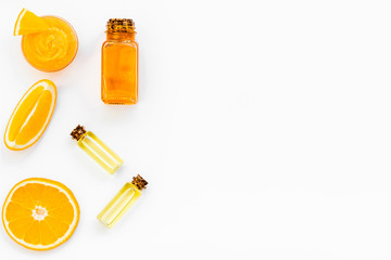 organic cosmetics for homemade spa with orange oil white background top view mockup