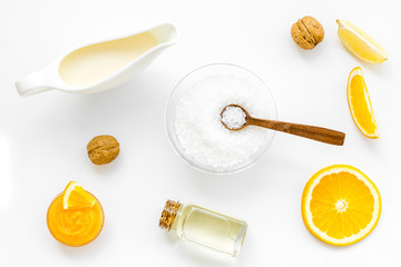 citrus orange cosmetic for natural spa bath on white table background top view pattern