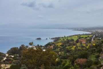 Looking across a campsite towards Chrysohou Bay, Laatchi, Polis and the Akamas Peninsula, Paphos, Cyprus.