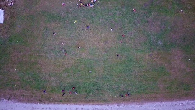 People playing Quidditch on meadow 