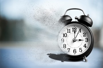 Retro alarm clock on   background