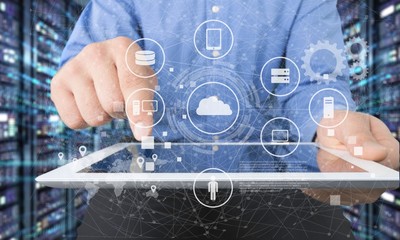 Male hands holding a tablet PC on background