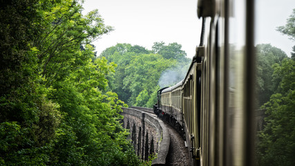 steam train on aqueduct bridge