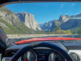 United States Road Trip - View of Yosemite National Park through a car windscreen
