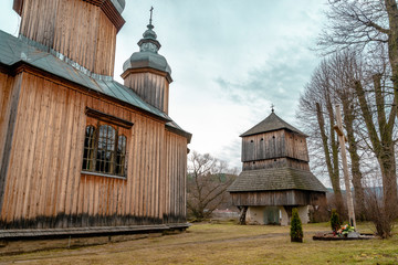 Fototapeta premium typical wooden church in village near Sanok town. Southern Poland