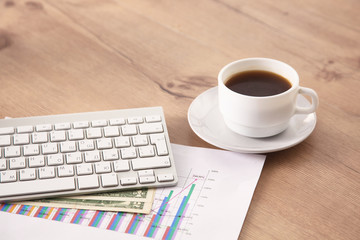 A cup of coffee on the office table