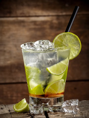 Caipirinha cocktail on wooden table