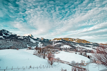 Landscape in Alpine Mountains of Gruyeres town village winter
