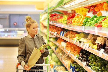 Woman buying vegetables at the market