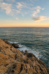 Sea view from rocks at sunset, Alassio, Liguria, Italy
