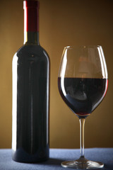 bottle of wine and glass on the table
