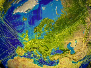 Europe from space on Earth with lines representing international communication, travel, connections.