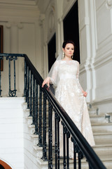 morning of the bride, a beautiful woman in a white dress is preparing for the wedding