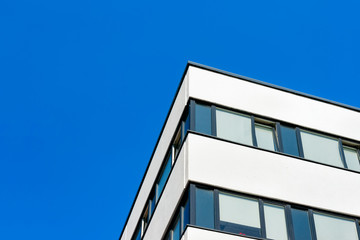 Modern corporate business office building skyscraper blue sky