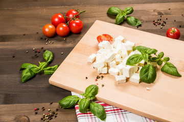 Chopped colorful ingredients on a cutting board