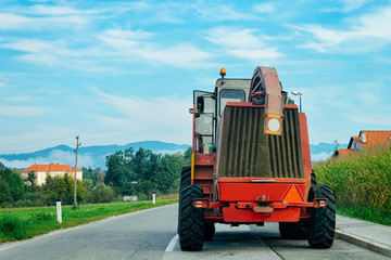 Agricultural tractor on highway road in Slovenia