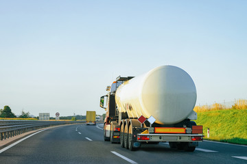 White Tanker storage truck at asphalt highway Poland © Roman Babakin
