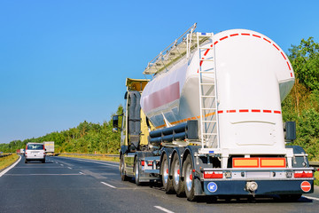 White Tanker storage truck on asphalt highway Poland