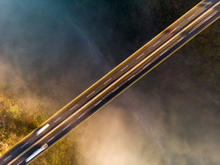 DRONE: BRIDGE WITH MIST AND RIVER 