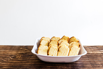 Sliced ​​Cake in White Basket, White Background