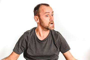 Obraz premium Man in studio with effort face, model expressions isolating white background