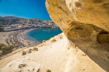 Matala beach on Crete island with azure clear water, Greece, Europe
