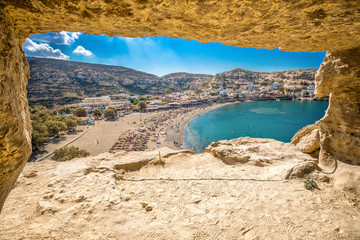 Matala beach on Crete island with azure clear water, Greece, Europe