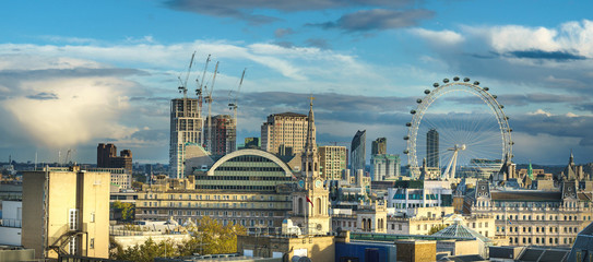 London, UK; October 2018: London skyline with London eye at cloudy day
