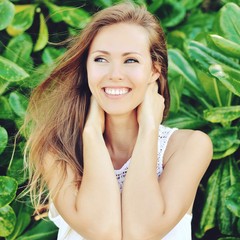 Beautiful smiling woman - close up portrait