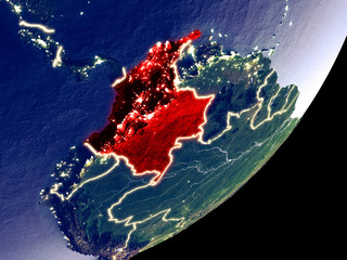 Colombia from space on model of Earth at night. Very fine detail of the plastic planet surface and...