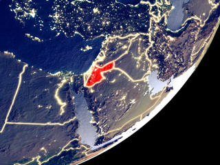 Jordan from space on model of Earth at night. Very fine detail of the plastic planet surface and visible bright city lights.