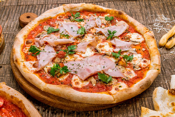 Pizza mortadella on plate