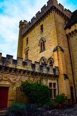 Fototapeta premium Facade of the Chateau de Puymartin in the Dordogne region of France 