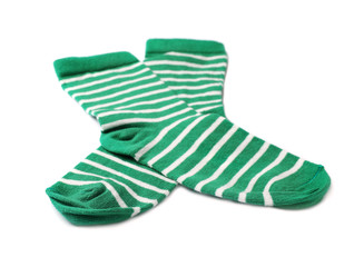 Pair of cute child socks on white background