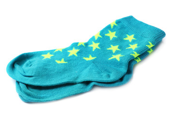 Pair of cute child socks on white background