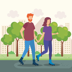 young couple with skates in the park